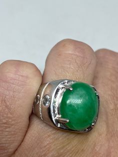 Vintage Lucky Green Nephrite Jade ring Large green nephrite jade Ornate German Silver Vintage ring, does not tarnish, NOT sterling Sizes 7 My jeweler can custom re size for a $10-$20 fee All rings are shipped free in the US in a nice gift box. Check out our over a THOUSAND great reviews Engraving is $4 per letter and is not always perfect depending on the piece. It can take a few days if the jeweler is busy. This is payable to Paypal Judithsltd@gmail.com Green Crystal Gemstone Ring For Spiritual Wear, Green Emerald Spiritual Ring, Emerald Healing Ring, Green Emerald Healing Ring, Green Emerald Cabochon Rings, Anniversary Green Gemstones With Polished Finish, Green Emerald Signet Ring With Gemstone, Green Signet Ring With Polished Finish For May Birthstone, Green Gemstone Signet Ring For Anniversary