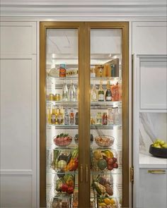 an open refrigerator filled with lots of different types of fruits and vegetables in it's doors