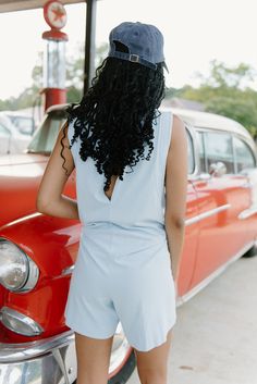 Indulge in ultimate comfort and style with our baby blue sleeveless T-shirt romper. The stretchy, relaxed fit allows for easy movement and lounging, while the rounded neckline adds a touch of elegance. Perfect for a day of relaxation or a casual outing, this romper is a must-have addition to your wardrobe! runs oversized with stretch model, Kennedi is 5'7" and wearing a size small Light Blue Cotton Summer Jumpsuits And Rompers, Light Blue Cotton Jumpsuits And Rompers For Summer, Light Blue Cotton Summer Jumpsuit, Chic Sleeveless Top For Lounging, Chic Light Blue Sleeveless Jumpsuits And Rompers, Summer Casual Tank Top For Lounging, Casual Summer Tank Top For Lounging, Light Blue Stretch Jumpsuits And Rompers For Summer, Light Blue Sleeveless Jumpsuits And Rompers For Day Out