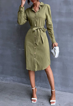 The EMES SHOP shirt dress is detailed with gorgeous contrast colored buttons that add flair to this dress. Features a collar. long sleeves. waist belt. front pocket. relaxed fit. and knee length. Style it with a fedora hat and heels for a showstopper look.MATERIAL:100% Soft Poly MEASUREMENTS:Dress Length is 43"-45"in Small | Bust: 37"-39"in & Waist: 34"-36"in Medium | Bust: 39"-41"in & Waist: 36"-38"in Large | Bust: 41"-43"in & Waist: 38"-40"in Casual Solid Color Shirt Dress For Work, Knee-length Solid Color Shirt Dress For Fall, Green Long Sleeve Solid Color Shirt Dress, Solid Color Knee-length Shirt Dress For Fall, Green Long Sleeve Shirt Dress, Fall Solid Color Knee-length Shirt Dress, Solid Color Collared Shirt Dress For Day Out, Solid Collared Shirt Dress For Day Out, Fitted Long Sleeve Belted Shirt Dress