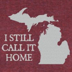 a t - shirt with the words i still call it home in white on a red background