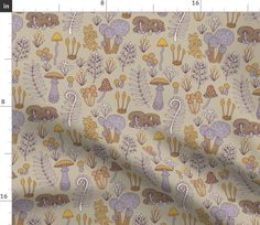 an image of a fabric with mushrooms and plants on it, as well as a ruler