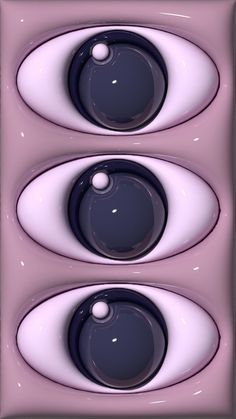 three black and white circles are in the middle of a pink background with two smaller ones