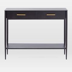 a black console table with two drawers on one side and gold handles on the other