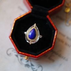 "Vintage Engagement Ring, Lapis Lazuli Promise Ring, Teardrop Lapis Lazuli Ring, Vintage Bridal Ring, Wedding Jewelry Set, Anniversary Ring Material: 925 Sterling Silver with Gold Plated Gemstone: Lapis Lazuli & Crystal  Ring Size: Adjustable for US 4 to US 9 Don't forget to find more designs from our shop: https://www.etsy.com/hk-en/shop/NikiFashionJewelry Be sure to hit \"favorite\" on the right so it remains in your favorites list and/ or add to your wish list(s). Hope you enjoy my designs. ❤ White Gold Teardrop Jewelry For Proposal, Silver Teardrop Jewelry For Proposal, Teardrop Sapphire Ring In Sterling Silver For Wedding, Elegant Teardrop Crystal Ring As Gift, Elegant Teardrop Sapphire Ring Gift, Teardrop Sapphire Ring In White Gold, Elegant Teardrop Crystal Ring Gift, Sapphire Teardrop Ring For Gift, Teardrop Wedding Ring With Bezel Setting