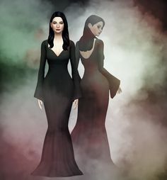 two women in long black dresses standing next to each other on a foggy background