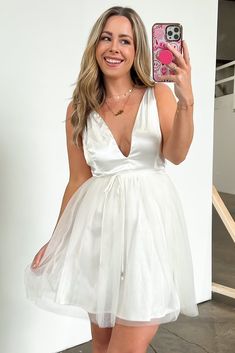 Details: Deep v-neck tulle skirt dress - Tulle skirt - Deep V-neck Content:92% Polyester 8% SpandexSize + Fit: Models are 5'4" (White) and 5'9" (Sage) and wearing a Small- Measurements from a size small- Full length:34''- Chest:34''- Waist:28'' Tulle Skirt Dress, Low Cut Dresses, Fit Models, Dress Tulle, Skirt Dress, Clothing Boutique, Tulle Dress