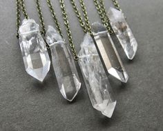 GRATITUDE SALE  ♥ Buy any 2 items, get a FREE surprise necklace! ♥ ✦ Ice Warrior Clear Quartz Necklace ✦ Carry a piece of the earth's inner beauty with you wherever you go! This simple yet stunning hematite-speckled clear quartz crystal necklace is the perfect versatile accessory for any occasion. ✧ Ethically sourced high clarity rough Brazilian quartz w/ black hematite inclusions and geometric indentations ✧ 100% natural raw crystal, not shaped or polished ✧ Crystal size 35-50mm long (1.4-2 inc Ice Warrior, Raw Quartz Necklace, Tibetan Quartz, Herkimer Diamond Necklace, Clear Quartz Necklace, Raw Crystal Jewelry, Raw Crystal Necklace, Quartz Crystal Necklace, Quartz Jewelry