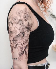 a woman with a tattoo on her arm