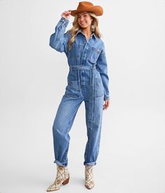 Ariat Georgia Denim Jumpsuit - Blue Small, Women's Denim 100% Cotton (Non-Stretch) - Rigid denim holds its shape and fades beautifully over time this jumpsuit will be your go to for years to come. Finding the perfect size in these fits is all about your preference. For a bigger looser look you may want to size up or for a more fitted look order true to size. Hidden button down jumpsuit Front patch pockets Waist tie and destruction details Inseam measures 28 14 bottom opening Bust measures 36 on Non-stretch High Rise Denim Jumpsuit, High Rise Non-stretch Denim Jumpsuit With Pockets, Casual Non-stretch Denim Jumpsuit With Button Closure, Button-up Denim Jumpsuit With Pockets In Medium Wash, Womens Denim Jumpsuit, Non-stretch Denim Jumpsuit With Button Closure, Denim Jumpsuit, Rompers Women, Favorite Jeans