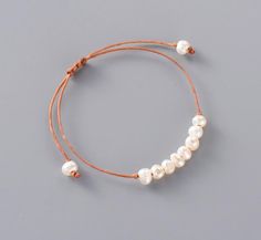 This splendid Boho Beaded Bracelet is carefully handmade with  Natural Fresh water  pearls . It features a Charming and Simple Design Giving you the  Charming Natural Inspired Beauty  . Length is  Adjustable . This Bracelet is handmade with natural pearls, because of that the shape and color of the beads might be slightly different than on the picture ; this is what makes  this Bracelet unique, just like you ! Treasure Jewelry, Bracelet Apple Watch, Simple Bracelets, Protection Bracelet, Chakra Bracelet, Mala Necklace, Leather Cuffs Bracelet, String Bracelet, Healing Bracelets