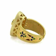 "This lovely vintage ring is crafted from 18k yellow gold with a matte finish. It features a wide cuff band with oval top with multicolor enamel leaf design along the band and on the oval shape design also accented with a round cut emerald gemstone. It has the metal content stamp 750. Material: 18k yellow gold Measurement: top: 0.52\" across x 0.79\" long x 0.31\" high Gemstone: Emerald 3.5mm Ring Size: 6.5 Weight: 9.7 grams 19453-M" Gold Oval Enamel Ring, Gold Oval Enamel Ring With Cabochon, Gold Oval Enamel Ring With Gemstone, Adjustable Yellow Gold Enamel Open Ring, Oval Hallmarked Yellow Gold Enamel Ring, Yellow Gold Oval Enamel Ring For Gift, Gold Enamel Ring With Bezel Setting As Gift, Gold Multi-stone Dome Ring, Yellow Gold Enamel Cabochon Ring