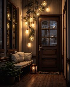 a door with lights hanging from it and a bench in front of the door that is lit up