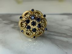 18kt yellow gold ring set with genuine sapphires! Weighs 6.0dwt, is 20mm at its widest point and is currently a size 7.5 but can be resized! Gold Sapphire Cluster Ring Hallmarked, Victorian Sapphire Ring In Gold, Gold Ring Sets, Yellow Gold Ring, Yellow Gold Rings, Rings Statement, Ring Set, Ring Sets, Sapphire Ring