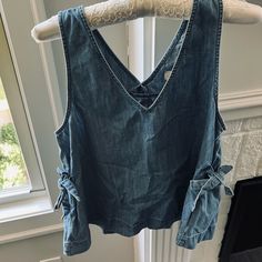 Never Worn. 21” Long, 16” Pit-To-Pit. Intended To Be Boxy/Loose And Have A “Swing” To It. Would Look Great With White Shorts Or Black Denim. 81% Cotton/ 19% Hemp. Has A Nice Weight To It - Very Well Made With Quality Stitching Throughout! No Flaws. Casual Medium Wash V-neck Denim Top, Casual V-neck Denim Top In Medium Wash, Casual V-neck Medium Wash Denim Top, Dark Wash Sleeveless Top For Spring, Spring Sleeveless Top In Dark Wash, Indigo Sleeveless Top For Spring, Casual Denim V-neck Top, Medium Wash V-neck Top For Day Out, Casual Dark Wash Blouse For Spring