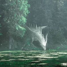 a large white dragon standing in the middle of a forest filled with trees and water