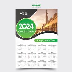 a green and white calendar with the image of a mosque in the background, on top of