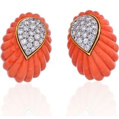 These exquisite David Webb 1970's Platinum & 18K Yellow Gold Coral and Diamond Earrings are a true testament to the brand's craftsmanship and timeless beauty. Carved with precision, the coral showcases intricate details that highlight the natural allure of the material. Adorned with brilliant cut diamonds weighing approximately 2.50 carats, these earrings radiate elegance and sophistication.The combination of 18 Karat gold and platinum creates a striking contrast against the vibrant coral and sp Haute Jewelry, Ocean Gifts, David Webb, Coral Earrings, Coral Jewelry, Antique Earrings, Diamond Design, Sparkle Diamonds, Intricate Details