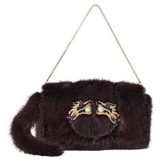 Gucci by Tom Ford Fall Winter 2004 mink fur bag, as seen on the runway. Features mink fur body, detachable crystal chain, embellished gold dragon with pearl centre on front and magnetic closure. In excellent vintage condition, comes with dustbag. Authenticity Guaranteed. As seen on Rihanna for her 35th birthday. Fabric: Mink  Dustbag: Yes Authentication card: No Serial number: 136545 20507 Measurements when laid flat:Length: 8 inches, Height: 5.5 inches, Width: 1 inches, Handle drop: 5 inches Fur Dragon, Burgundy Clutch, Gucci By Tom Ford, 2004 Runway, Navy Clutch, Tom Ford Gucci, Gucci Vintage Bag, Gucci Clutch, Gucci Spring