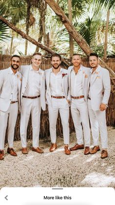 a group of men standing next to each other wearing white suits and brown shoes with palm trees in the background