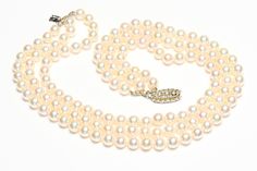 Buccellati Pearl Diamond Necklace. Vintage Mario Buccellati 18K gold and diamond clasp 3 strand pearl necklace. Indulge in the timeless elegance and exquisite craftsmanship of the Buccellati pearl and diamond gold necklace. This luxurious piece showcases the perfect harmony between classic beauty and modern sophistication. Signed Mario Buccellati Italy 750. Features: Material: 18K Gold Gemstones: High-quality pearls and dazzling diamonds Design: Intricately handcrafted with Buccellati's signature lace-like openwork, reflecting the brand's dedication to artisanal excellence Length: 18 inches Clasp: Secure and easy-to-use clasp, ensuring both safety and comfort Highlights: Pearls: Luminous pearls that radiate a soft, iridescent glow, symbolizing purity and elegance, each measuring 9mm. Diamo Elegant Double Strand Diamond Necklace, Elegant Double Strand Diamond Necklaces, Formal Double Strand Pearl Necklace With Pendant, Luxury Double Strand Pearl Necklace For Formal Occasions, Luxury Pearl Necklace With 17 Jewels, Luxury Double Strand Pearl Necklace, Luxury Pearl-embellished Jewelry For Anniversary, Luxury Diamond Necklace With Pearl Drop, Classic Pearl Necklace With 17 Jewels For Wedding