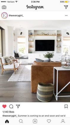 a living room filled with furniture and a flat screen tv mounted on a wall above a fireplace