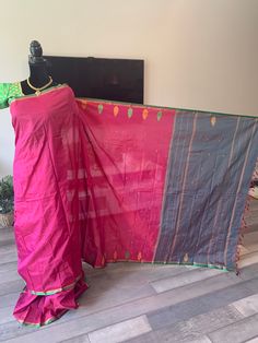 This is a gorgeous, premium quality mixed silk saree in bright hues with contrast border and pallu. The saree comes with small thread or zari bhuttis and a small contrast border. The saree and pallu are contrasting shade. The saree comes with optional stitched blouse. Falls/pico can be done at an added price. Bollywood Style Blouse Piece With Border In Cotton Silk, Bollywood Style Cotton Silk Blouse Piece With Border, Celebration Chanderi Saree With Border, Pink Chanderi Blouse With Border, Pink Chanderi Blouse Piece With Border, Celebration Unstitched Paithani Silk Blouse Piece, Unstitched Paithani Silk Blouse Piece For Celebration, Bollywood Style Pink Blouse Piece With Border, Bollywood Style Pink Blouse With Border