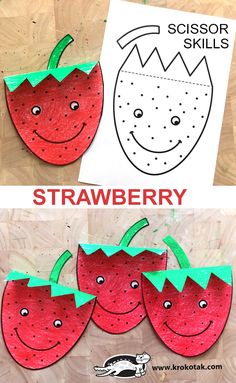 paper strawberries cut out to look like they are smiling