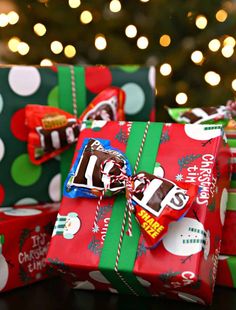 christmas presents wrapped in wrapping paper with candy on them