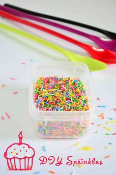 sprinkles in a plastic container on a table