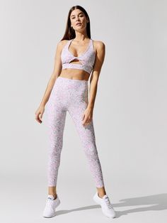 Look cute and fit in this Power Flower Set, featuring a cutout sports bra and high waisted leggings. Spring Workout Activewear With Built-in Bra, Athleisure Sports Bra For Gym, Sporty Yoga Sports Bra For Spring, Athleisure Sports Bra For Gym In Spring, Sleeveless Activewear For Pilates In Spring, Fitted Sports Bra For Yoga And Spring, Floral Print Fitted Activewear For Gym, Fitted Floral Print Activewear For Sports, Spring Pilates Sports Bra With Medium Support