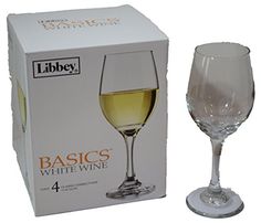 a wine glass sitting next to a box