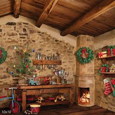 a room decorated for christmas with stockings and wreaths on the fireplace mantel next to a bike