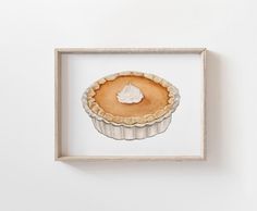 an image of a piece of pie in a frame on the wall with it's crust cut out