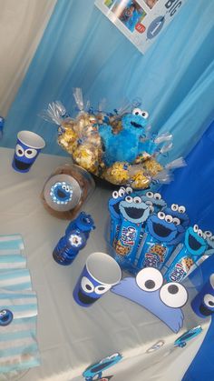 a table topped with blue and yellow items