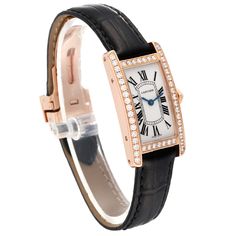 Cartier Tank Americaine Small Rose Gold Diamond Ladies Watch WJTA0002. Quartz movement. 18K Rose gold case 19.0 x 28.0 mm. Octagonal crown set with an original Cartier factory diamond. Original Cartier factory diamond bezel. Scratch resistant sapphire crystal. Silver opaline dial with Roman numerals. Sword shaped blued steel hands. Black leather strap with 18K rose gold deployant clasp. Classic Formal Jewelry And Watches With Diamond Accents, Classic Cartier Jewelry With Diamond Hour Markers, Classic Wedding Jewelry And Watches With Diamond Hour Markers, Cartier Diamond Watch With Polished Finish For Formal Occasions, Classic Watch With Diamond Accents And Rectangular Dial, Elegant Cartier Gold Diamond Watch, Elegant Gold Cartier Diamond Watch, Cartier Diamond Watch For Wedding With Polished Finish, Cartier Diamond Watch As Gift