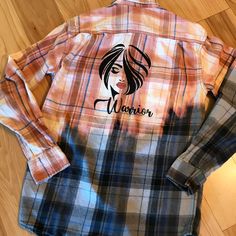 Bleached flannel for women, men's size 34-36, upcycled designer painted flannel with a lady portrait and "Warrior" painted on the back.  This is a cute reworked fall plaid shirt which would be great for back to school or college this fall or would make a great gift for anyone who enjoys wearing fun, unique clothing! (WANT TO SEE MORE FROM THIS COLLECTION? Type BPWG in this store's search field.) DETAILS: Size:  Men's 34-36  (I would estimate women's size small to medium) Brand:  Faded Glory Materials:  100% cotton MEASUREMENTS: Top of shoulder to hem:  29 inches Width across back at armpit:  19 inches Sleeve length:  24 inches Be sure to check the size and measurements.  Sizing for clothing brands is often different! Hint:  To be sure this item will fit, lay your favorite shirt out flat an Fitted Flannel Shirt For Fall, Bleach Flannel Shirt Diy, Painted Flannel, Bleached Flannel Shirt, Bleached Flannel, Lady Portrait, Upcycle Shirt, Fall Plaid, Clothing Details