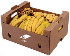 a cardboard box filled with lots of ripe bananas