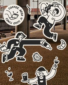 some stickers on the ground near a train station