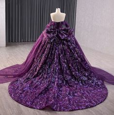 Experience a regal sensation in our exquisite deep purple party ball gown, adorned with luxurious and vibrant multi-colored sequined designs. The stunning sweetheart neckline and fitted bodice add a touch of elegance, while the satin ribbon lace up back allows for a comfortable and customizable fit. Complete with a sweeping train, this gown is sure to make a statement. material: organza color: as shown type: party ball gown built in bra sweetheart neckline off the shoulder long drape train as shown lace up back original photos Plum Quinceanera Dresses, Quinceanera Dresses Dark Purple, Royal Purple Quinceanera Dresses, Dark Purple Quinceanera Theme, Dark Purple Quinceanera Dresses, Purple Quince Dress, Slay Dresses, Sweetheart Neckline Off The Shoulder, Quinceanera Dresses Red