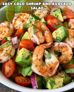 shrimp and avocado salad in a white bowl