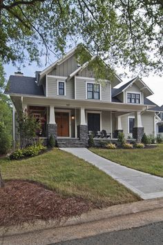 a house that is sitting in the grass