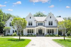 a large white house with lots of windows