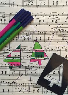 the sheet music has been made with markers and crayons to make shapes that look like airplanes