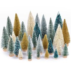 a group of small christmas trees sitting next to each other