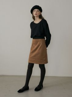 Editor's NotesThis basic mini skirt is made from eco-suede that's warm and ideal for winter season. It's designed in A-line silhouette with high-waist that makes elongated looking and the length is just right for comfortabl - Concealed back zip closure- High waist- A-line silhouette- Mini-length- LinedMeasurements (in.) S / M - Total Length: 19.3 in. / 20.1 in.- Waist: 12.6 in. / 13.8 in.  - Hip: 17.3 in. / 18.1 in.  - Hem: 20.5 in. / 21.3 in. * Recommend size S for waist size 24-26, size M for waist size 27-28.Model Info: 5'5 / Fitting size SComposition & Care- 90% Polyester, 10% Span- Dry cleanDesigner- by REORG Winter Brown Mini Skirt With Lining, Winter Brown Lined Mini Skirt, Brown Mini Skirt For Winter Workwear, Brown Winter Mini Skirt For Work, Brown Skort For Workwear In Fall, Brown Relaxed Fit Skort For Fall, Suede Mini Skirt, Winter Season, Waist Size