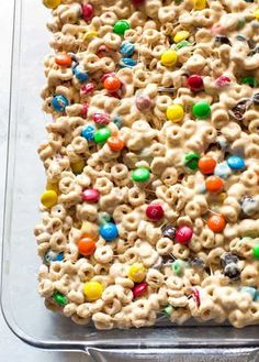 a tray filled with cereal krispy kreme treats