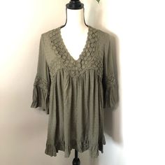 New Embroidered Eyelet Bell Sleeve Mini Dress By Tantrums. Olive Green Color. 3/4 Sleeve. Embroidered Trim. Mini Length (Could Be Worn As A Longer Shirt). V-Neck. Size M. Approx Measurements: Length (28 In), Armpit To Armpit (22 In). Excellent Condition. New With Tags. Spring Embroidered Half Sleeve Dresses, Summer Lace Dress With Bell Sleeves, Summer Lace Dresses With Bell Sleeves, Half Sleeve Embroidered Spring Dress, Half Sleeve Embroidered Dress For Spring, Spring Green Mini Dress With 3/4 Sleeves, Spring V-neck Dress With Crochet Trim, Bohemian Dresses With Floral Embroidery And 3/4 Sleeves, Spring Bohemian Mini Dress With 3/4 Sleeves