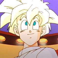 the young gohan is looking at something in front of his face with blue eyes