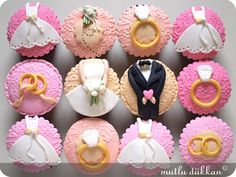 wedding cupcakes in the shape of bride and groom's rings